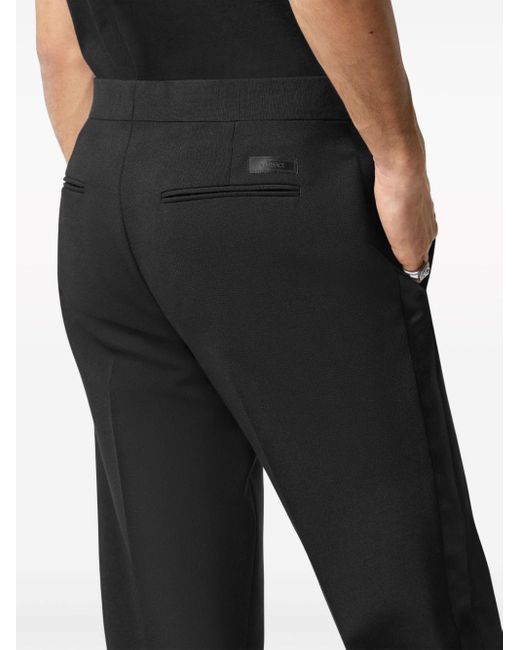 Versace Black Trousers With Silk Details for men