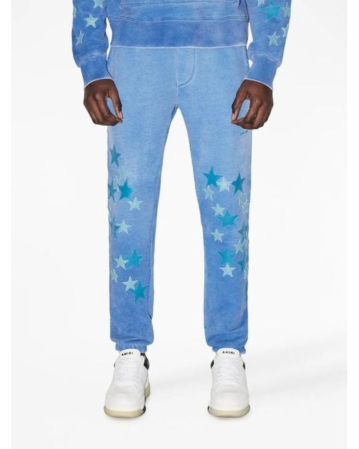 Amiri Blue Star-Patch Cotton Track Pants for men