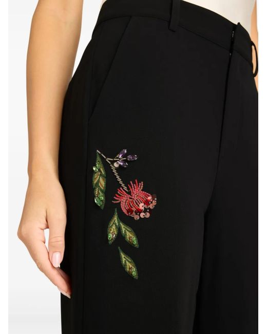 Pantalones Harlan con motivo floral Cinq À Sept de color Black