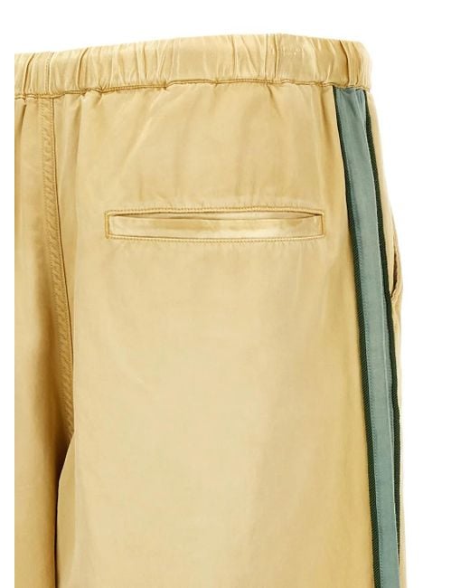 Maison Mihara Yasuhiro Yellow Aged Satin Track Pants for men
