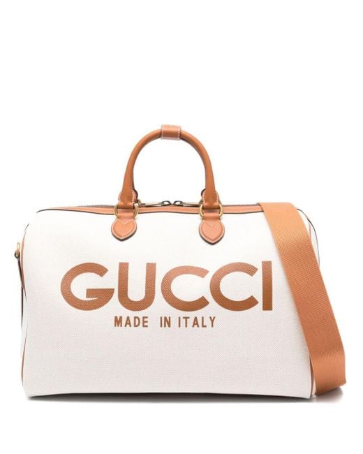 Gucci Pink Logo-print Canvas Holdall for men