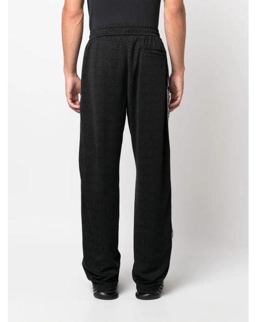 Versace Black Allover Pattern Track Pants for men