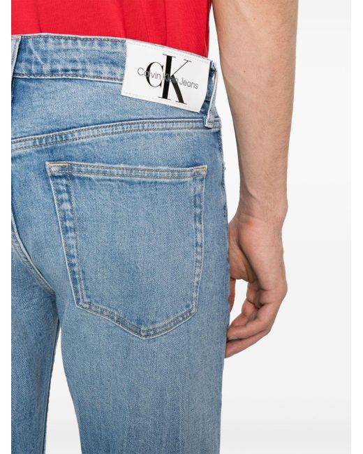 Calvin Klein Gerafelde Jeans Met Toelopende Pijpen in het Blue voor heren