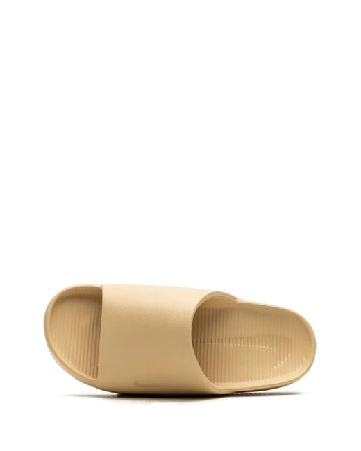 Sandali Slides Calm Sesame di Nike in White