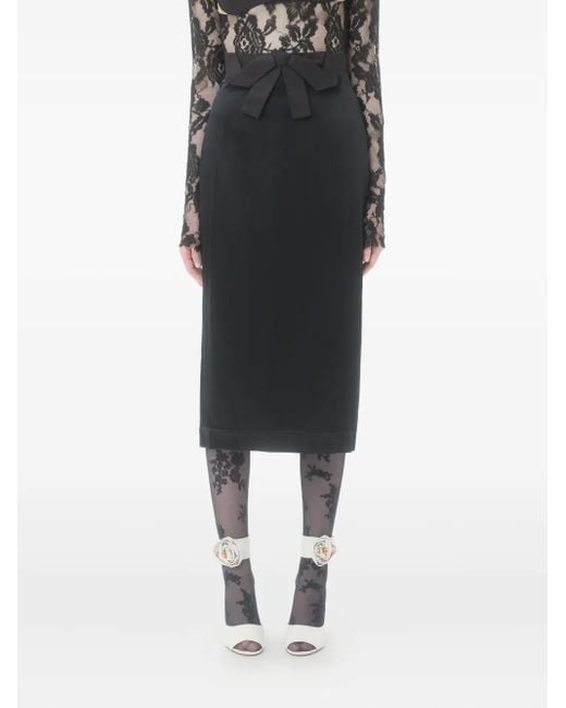 Falda midi con detalle de lazo Valentino Garavani de color Black