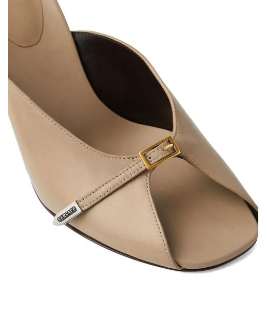 Mules Nyx di Versace in Natural