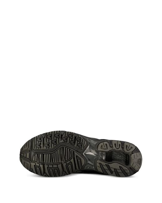 Mizuno Black Baskets Wave Rider 10 for men