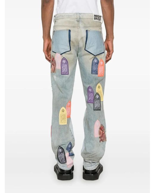 Who Decides War Blue Patch Arched Distressed Jeans for men