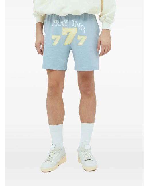 PRAYING Blue 777 Graphic-Print Shorts