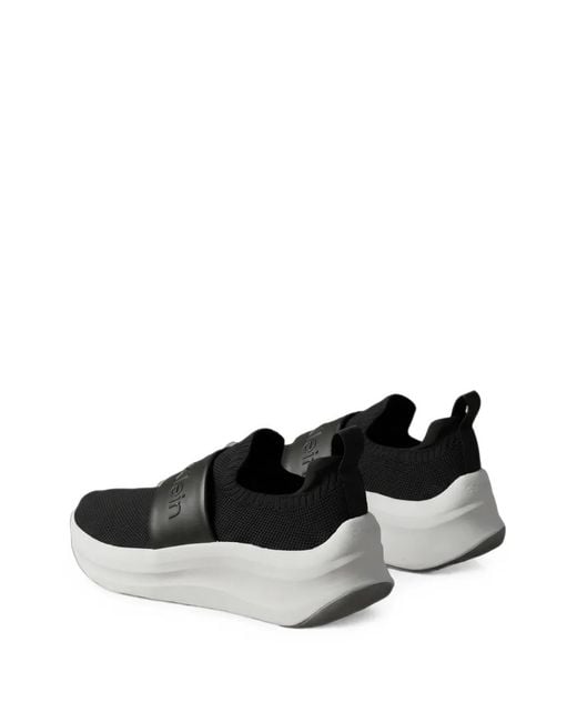 Calvin Klein White Calvin Klein Dark Slip-On Runner Trainers