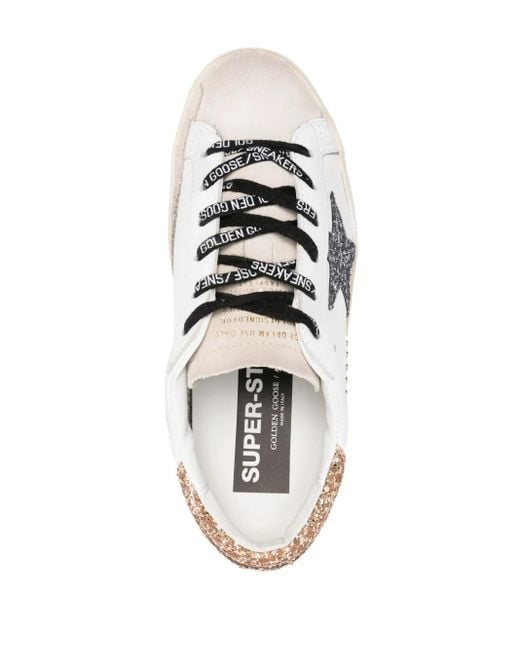 Golden Goose Deluxe Brand White 'Super-Star' Sneakers With Star And Glitter Heel