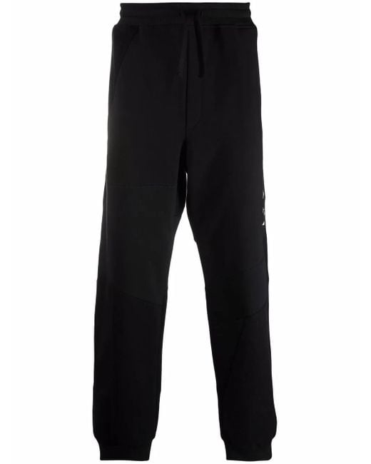 Valentino Garavani Black Vltn-Print Track Pants for men