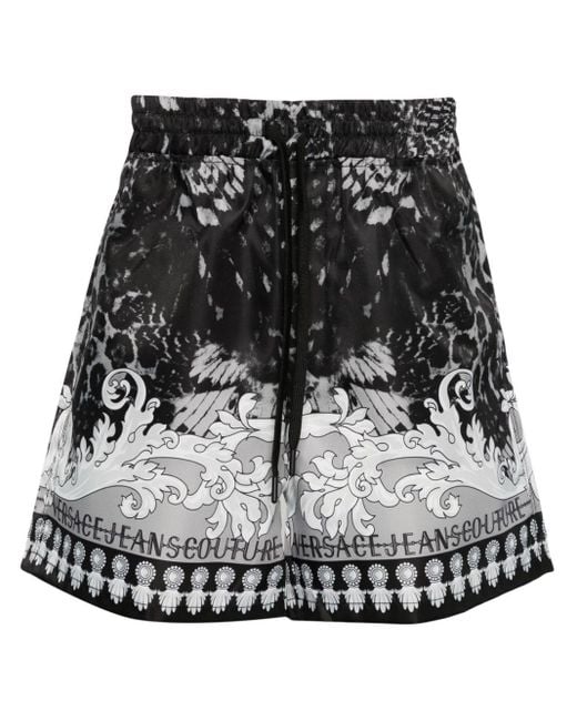 Shorts con stampa Watercolour Couture di Versace in Black da Uomo