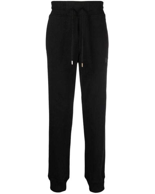 Pantaloni sportivi con applicazione logo di Versace in Black da Uomo