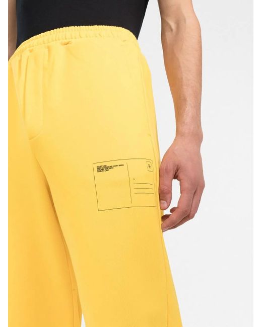 Helmut Lang Yellow New York Postcard Track Trousers for men