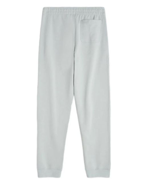 Maison Kitsuné White Logo-Patch Trousers for men