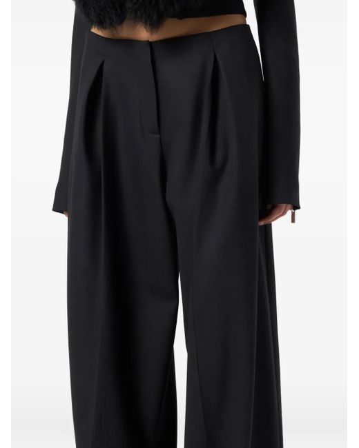 Pantalones con cremallera Blumarine de color Black