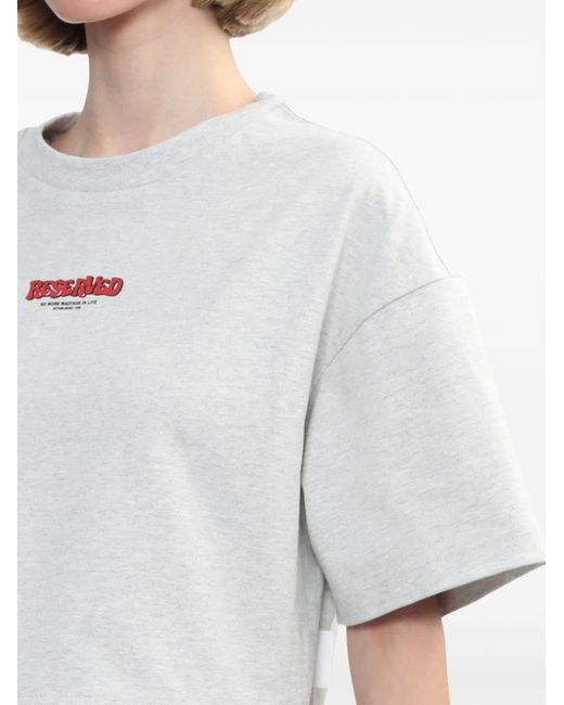 T-shirt en coton à imprimé graphique Izzue en coloris White