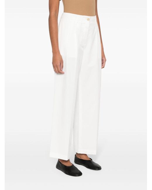 Pantalones rectos lisos Totême  de color White