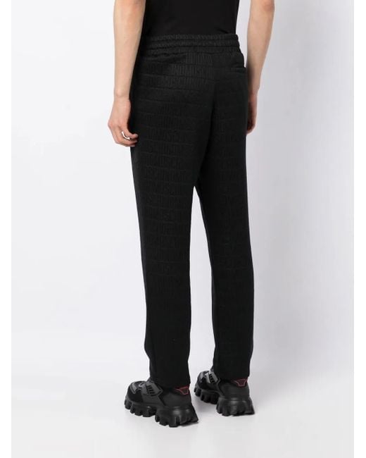 Moschino Black Logo-Print Trousers for men