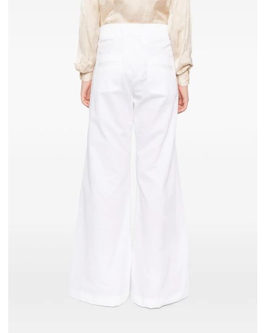 BLAKLACE White Flared Trousers