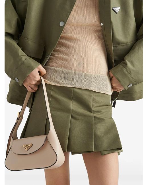 Minifalda Con Logo Triangular Prada de color Green