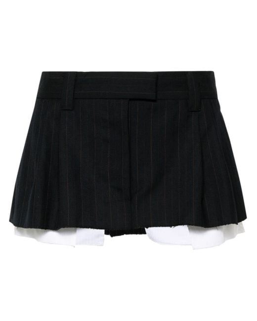 Minifalda a rayas diplomáticas Miu Miu de color Black