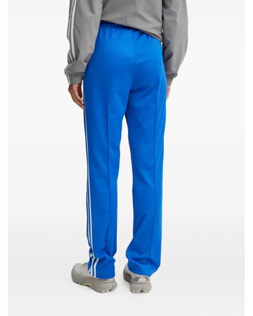 Adidas Blue Three-Stripe Track Pants