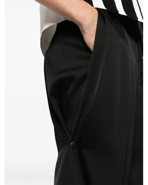Amiri Black Logo-Plaque Straight-Leg Trousers for men