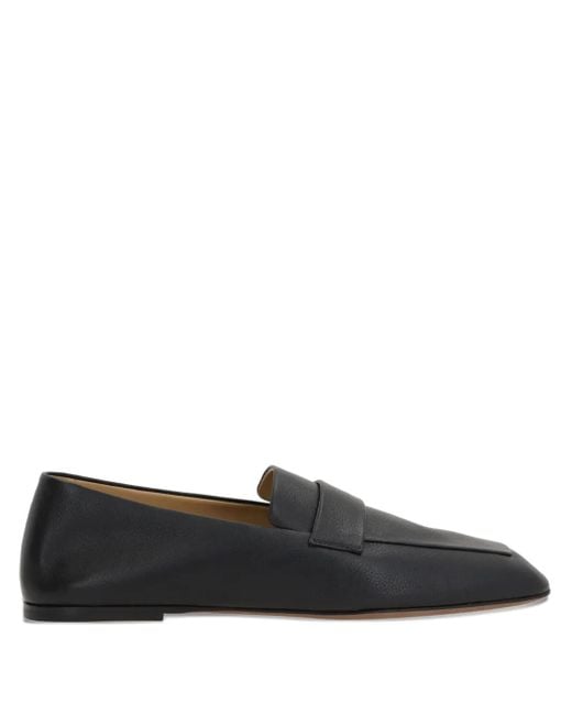 The Row Black Leather Penny Loafers