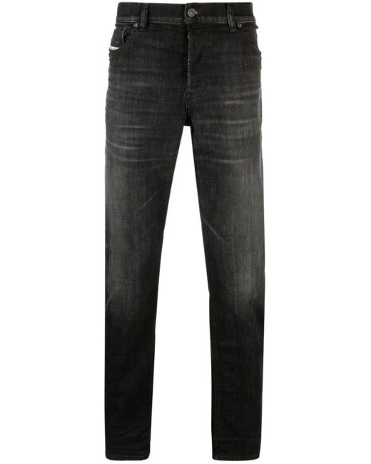 DIESEL Black Logo-patch Cotton-blend Tapered Jeans for men