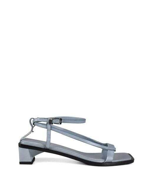 ANEST COLLECTIVE White Linea Sandals