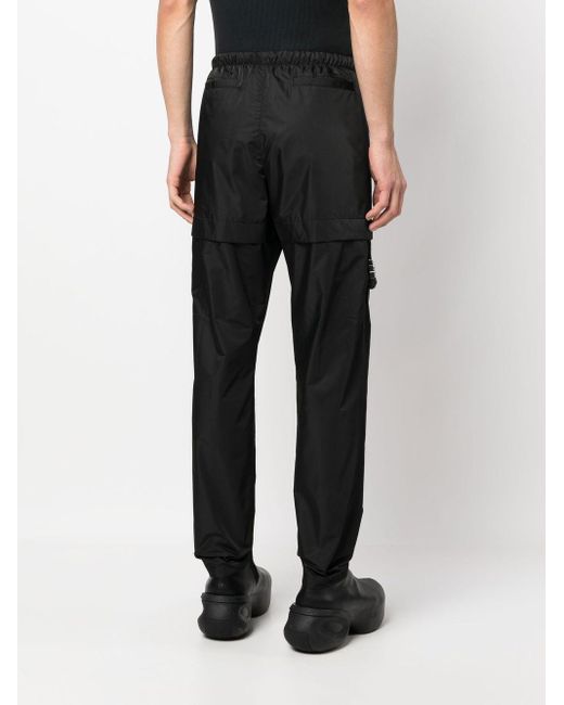 Pantalon droit à détail de boucle Givenchy pour homme en coloris Black