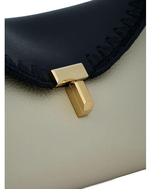 Clutch T-Lock di Totême in Blue