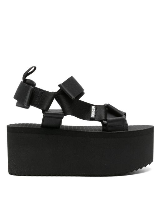 Sandalias con plataforma de 80 mm Moschino de color Black