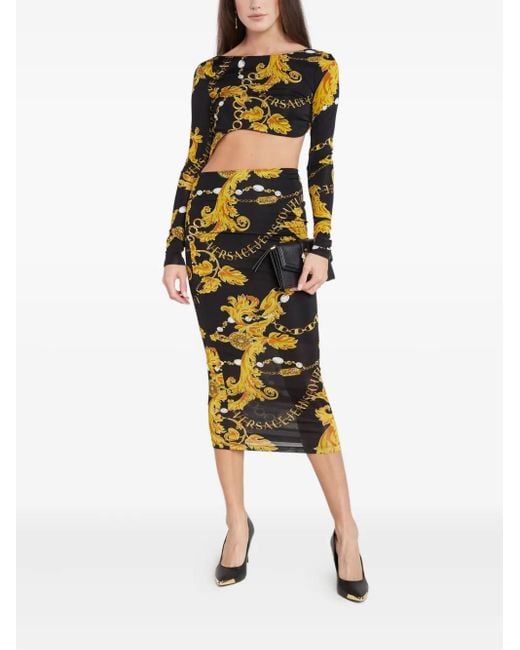 Vestido midi con estampado barroco Versace Jeans Couture de color Black