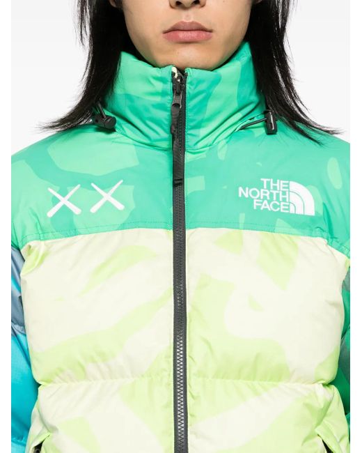 The North Face Green X Kaws Nuptse 1996 Jacke
