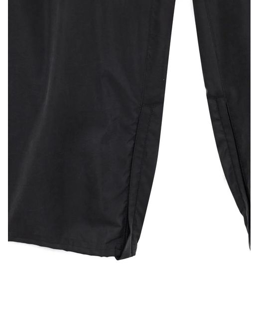 Ssstein Black Elasticated Zip-Cuff Trousers for men