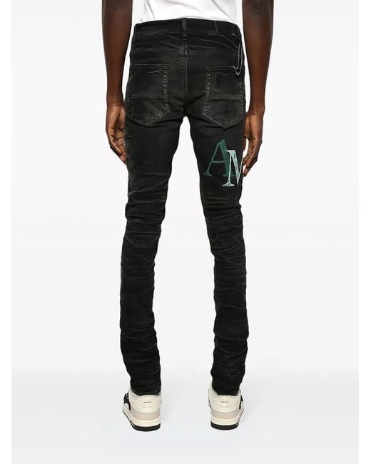 Amiri Black Logo-Patch Distressed Skinny Jeans for men