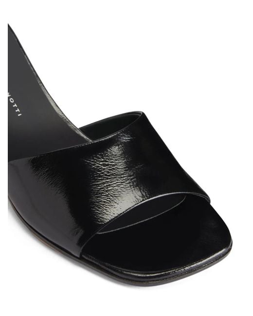 Mules Solhene di Giuseppe Zanotti in Black