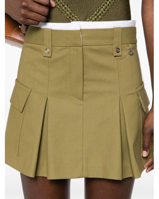 Jinima low-waisted cargo miniskirt Maje de color Natural