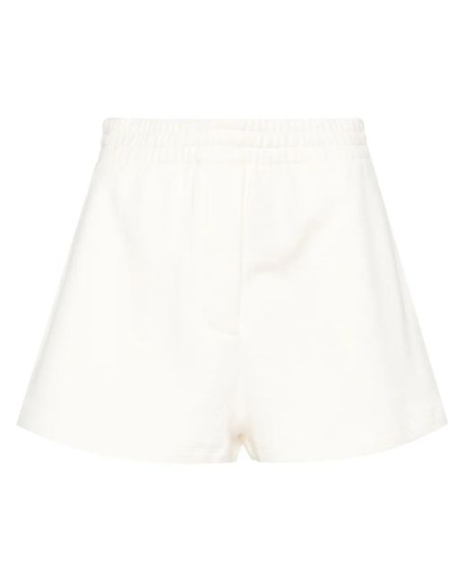 Pantalones cortos con logo triangular Prada de color White