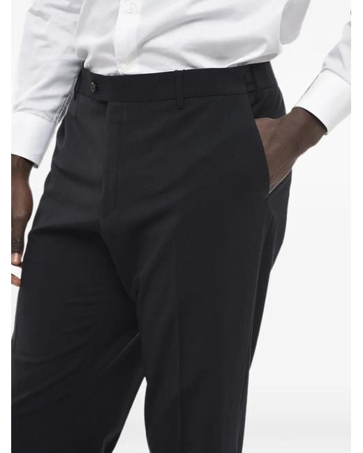 Corneliani Black Pressed-Crease Trousers for men