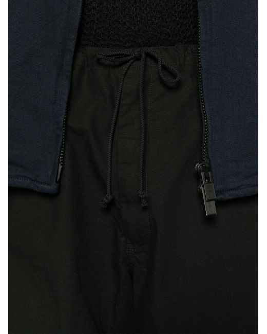 Pantaloni A-Side Tuck a gamba ampia di Yohji Yamamoto in Black da Uomo