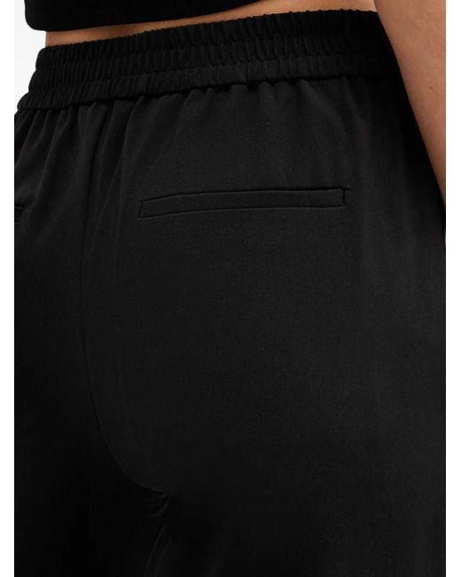 Pantaloni Aleida Con Pieghe di AllSaints in Black