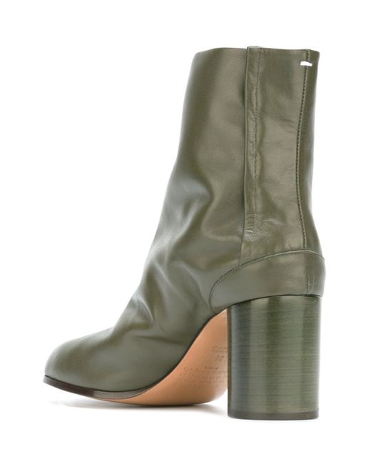 brushed off metallic green tabi boots with plexiglass heels