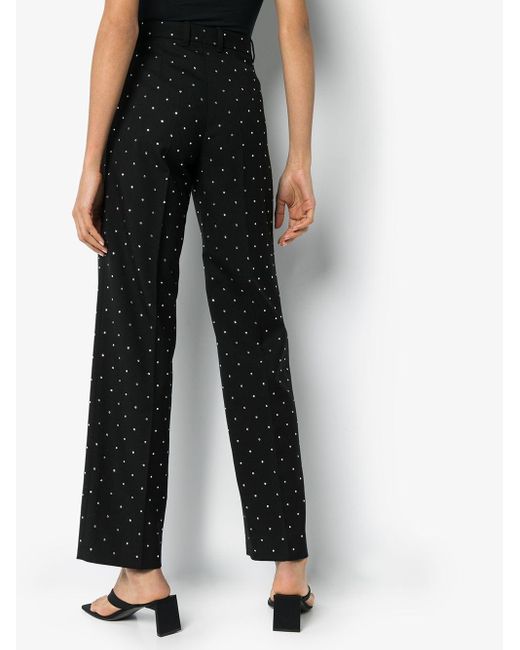 Pantalones con detalle de cristales Balenciaga de color Black