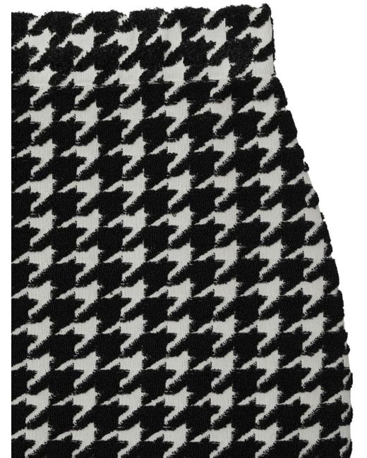 Minifalda con motivo pied de poule Burberry de color Black