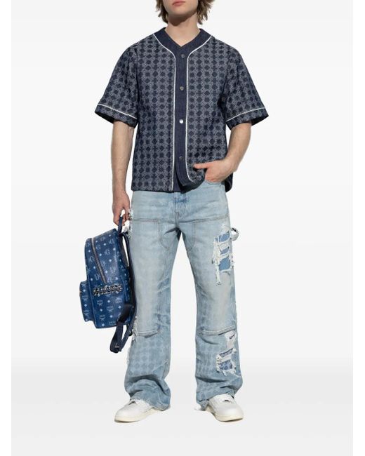 Amiri Blue Distressed Patchwork Jeans for men