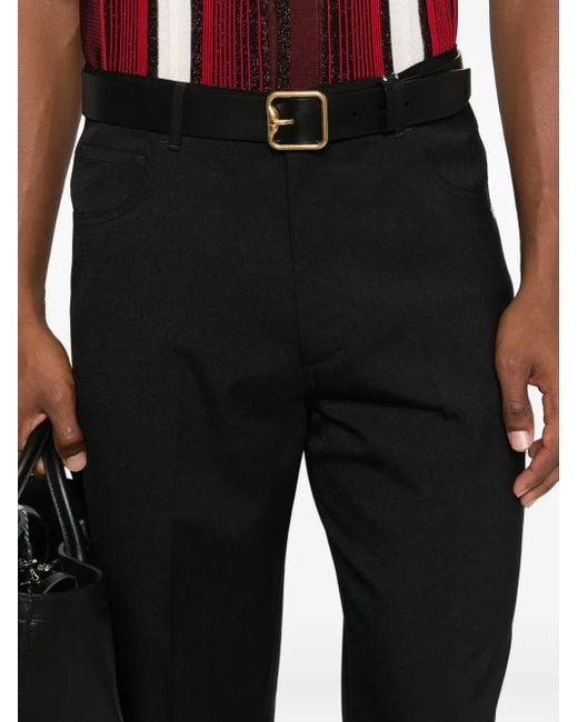 Amiri Black Button-Fly Bootcut Trousers for men